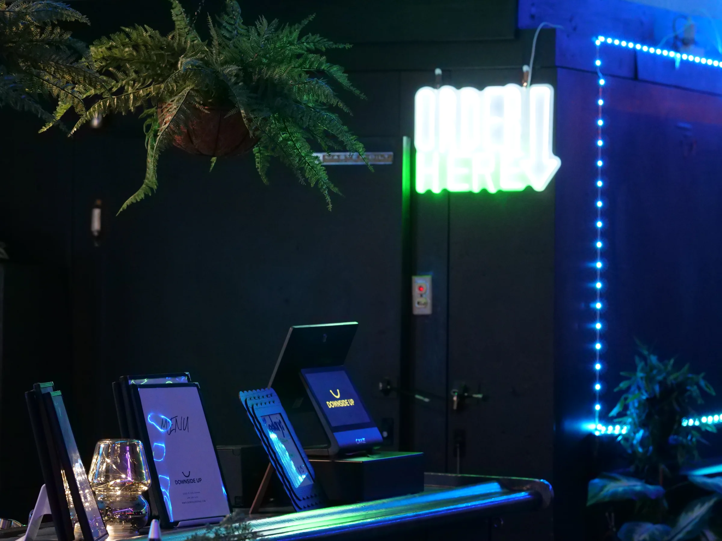 Downside Up interior — bar area with warm lighting and seating
